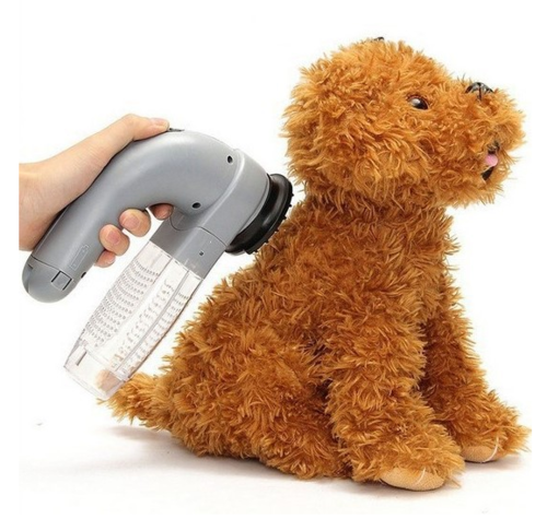 Brosse de nettoyage électrique portable pour poils d'animaux